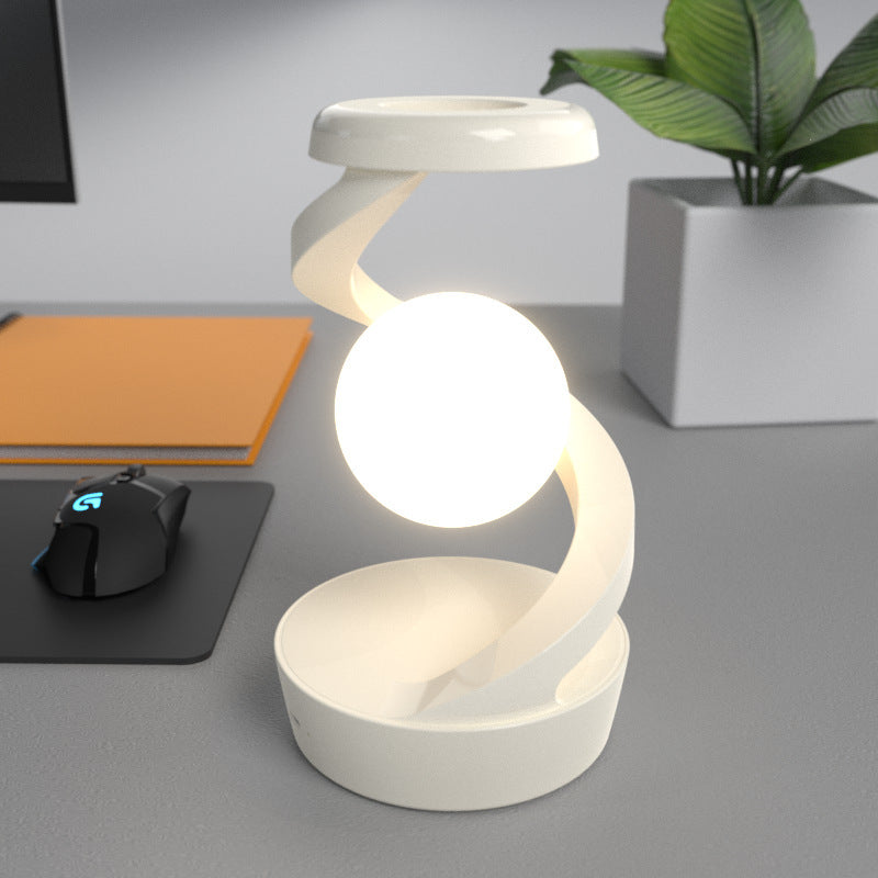 Lampada da scrivania lunare rotante con sensore di ricarica wireless del telefono. Lampade da tavolo di controllo Lampada da tavolo decorativa Piccola lampada da notte Decorazioni per la casa